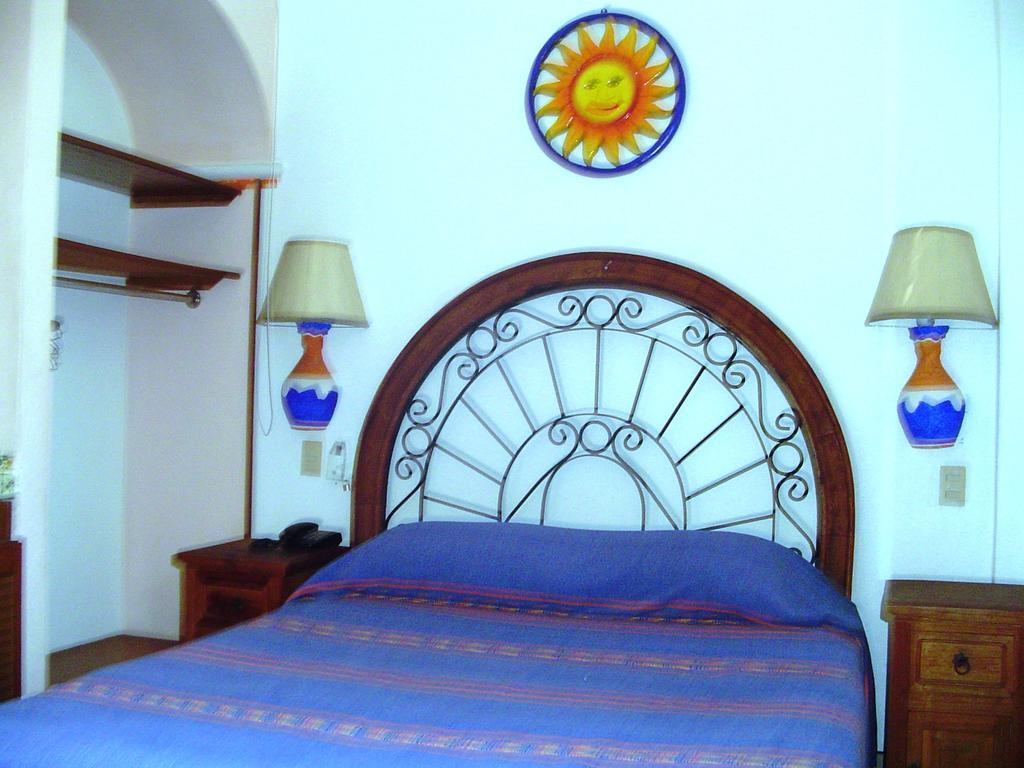 Hotel & Suites Coral Puerto Vallarta Rom bilde